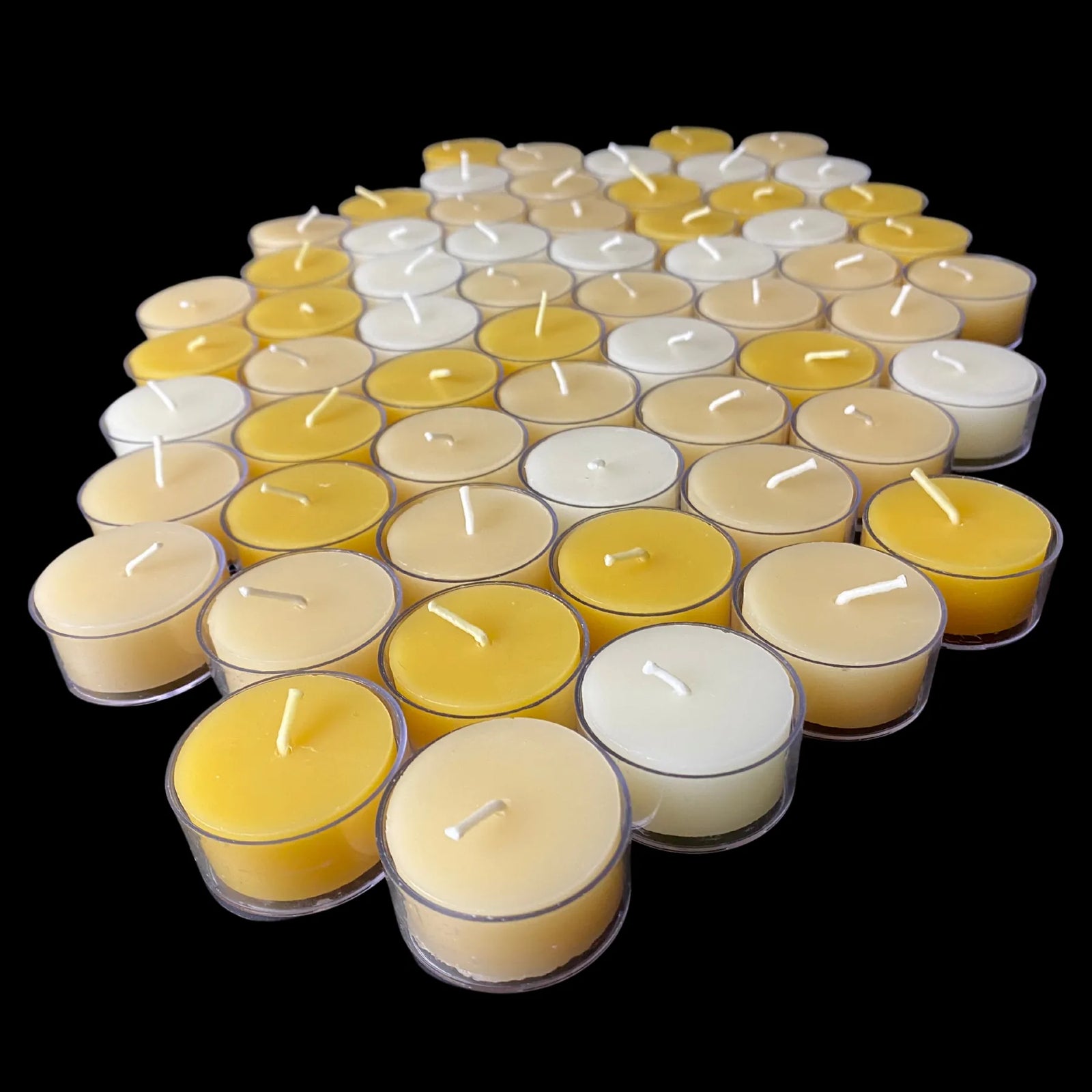 White, yellow and cappings beeswax tea lights in clear cups, 1.54" wide, made in USA