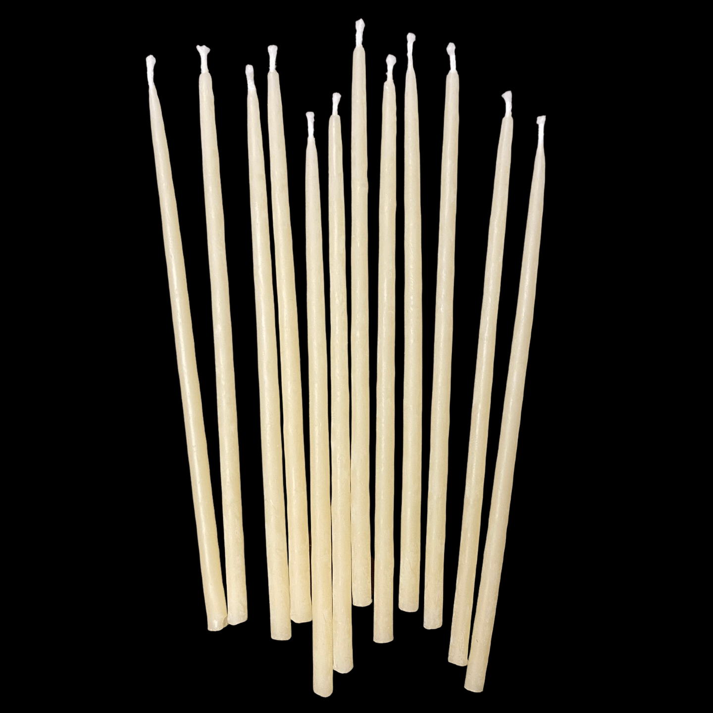 Cappings beeswax 6-inch skinny birthday taper candles standing upright in natural beige