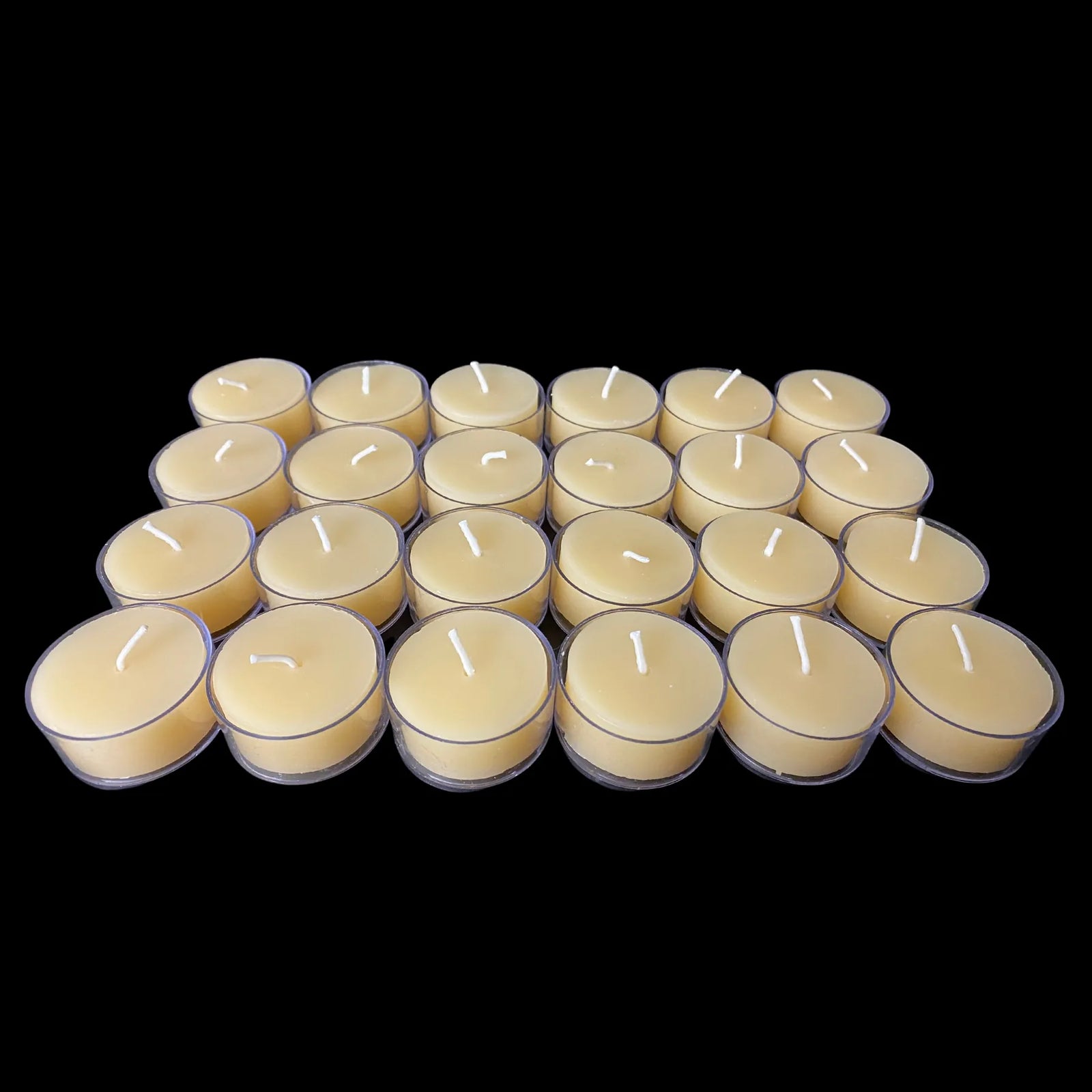 Cappings beeswax tea lights in clear cups in a low grid, set of 24, honey scent