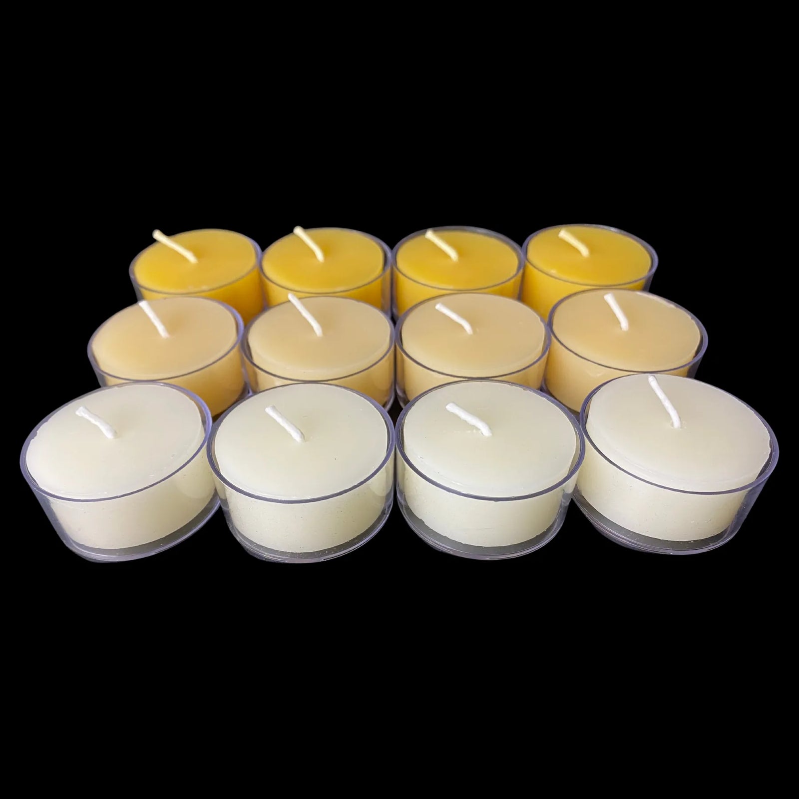 Mixed beeswax tea lights in clear cups, white, yellow and cappings, set of 12