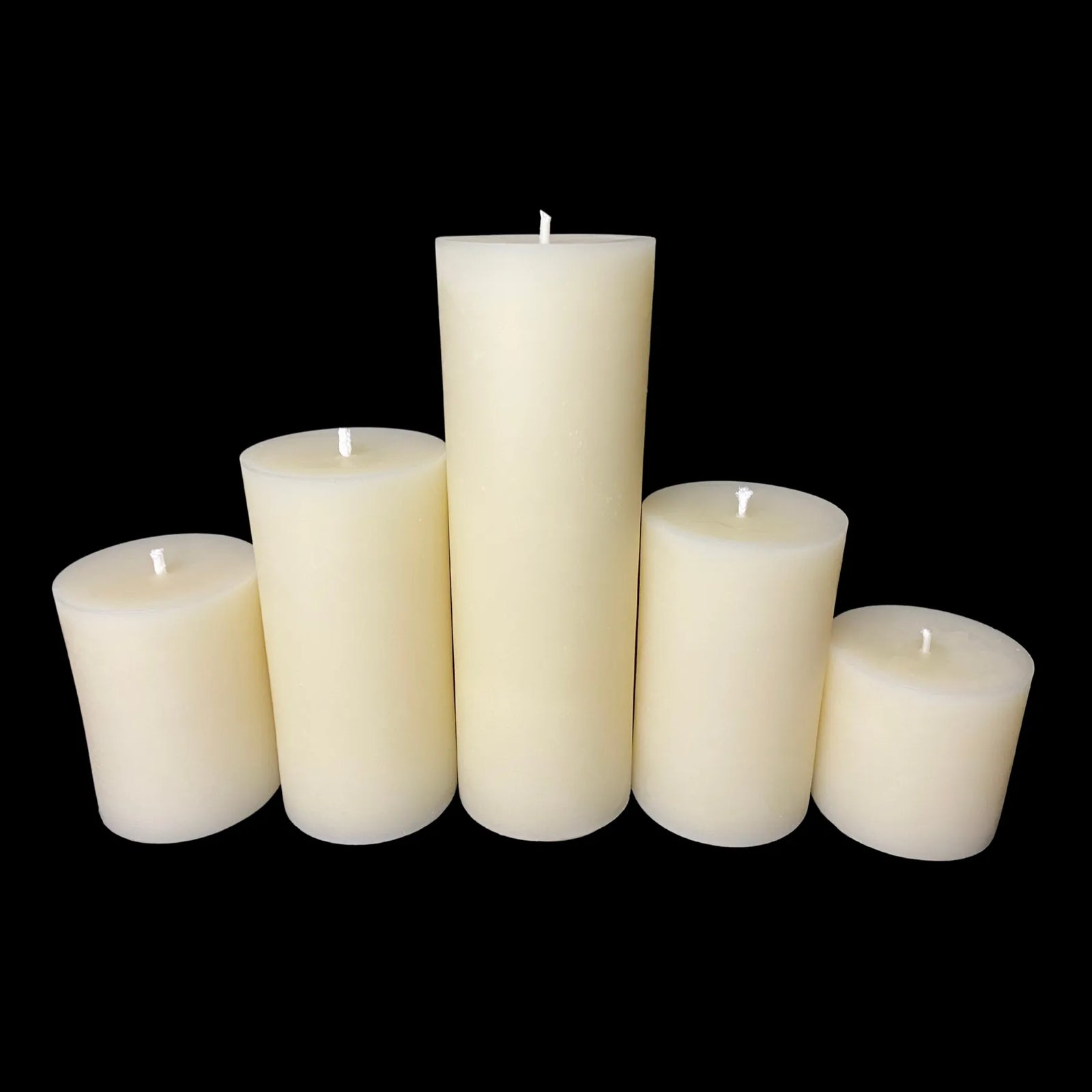 Set of five ivory beeswax candles, 3 in width, ideal for serene home setups or natural wedding decor.