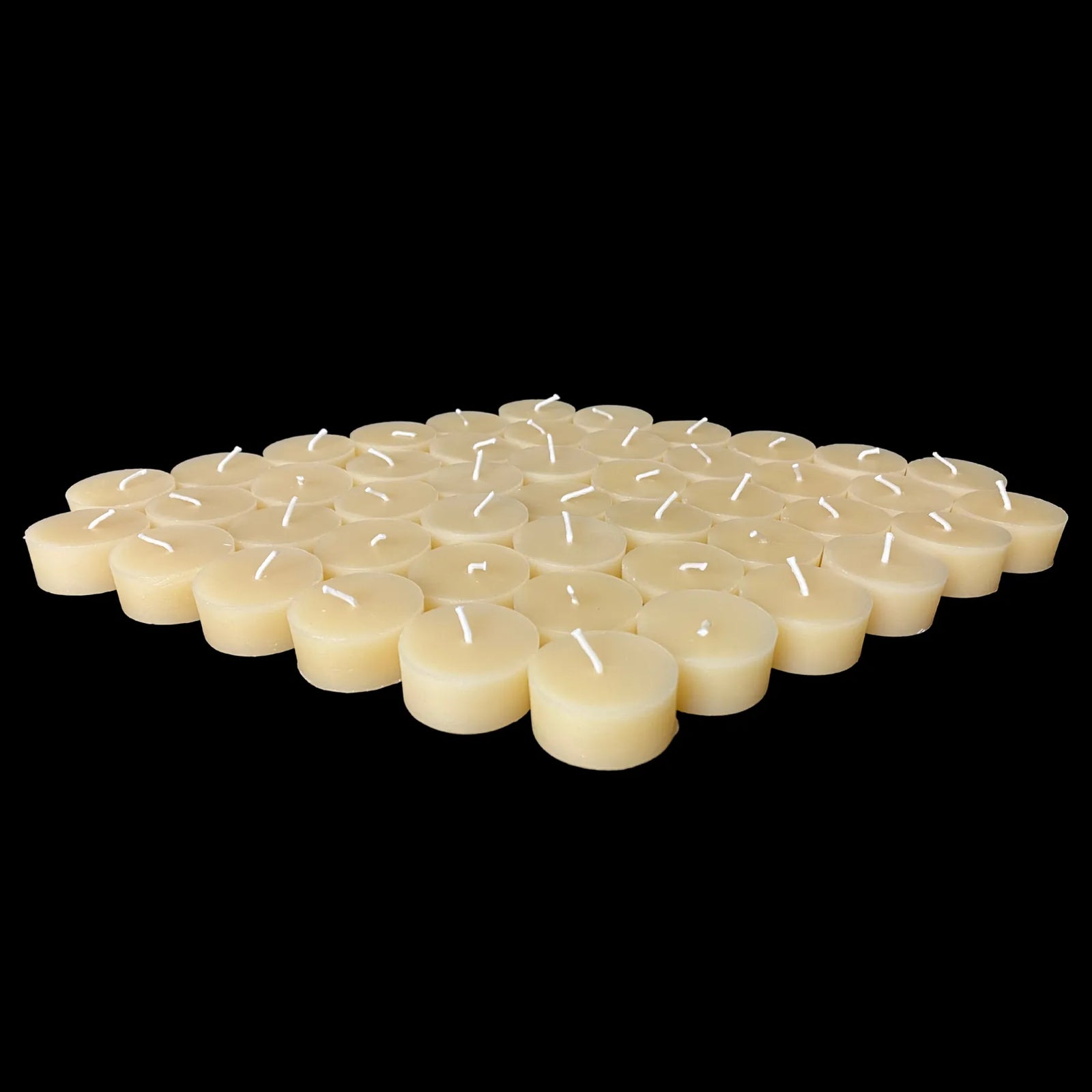 Cappings beeswax tea lights in a flat diamond, large set, natural cream color