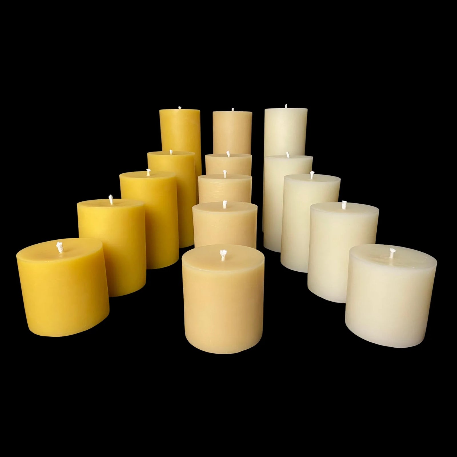 Three inch beeswax candles in assorted colors, perfect for eco-friendly events or home styling.