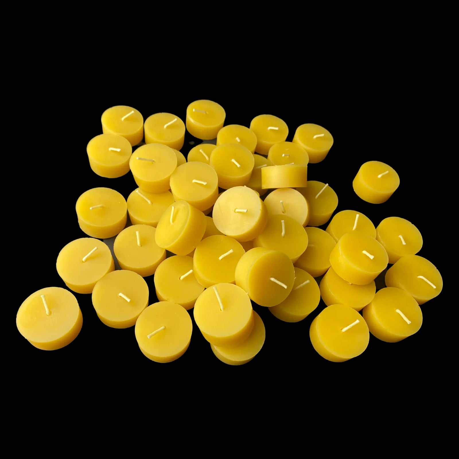 Cluster of golden yellow beeswax tea lights, pure beeswax, honey scented